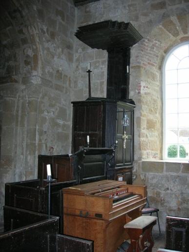 A sealed-up niche was discovered, plastered over, in the nave on the north side of Fig 15 Pre- Reformation chapel niche, exposed Fig 17 Three decker pulpit with sounding board the chancel arch.