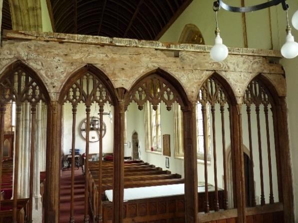 An important feature of the church is the early 16 th century screen, 2x5 bays, restored in 1903, with 16 th century painted decoration on the rear of the