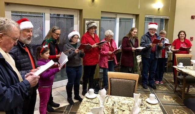 A small group of singers from St. Alban visited four retirement homes during Christmas week bringing residents and staff a special kind of holiday cheer.