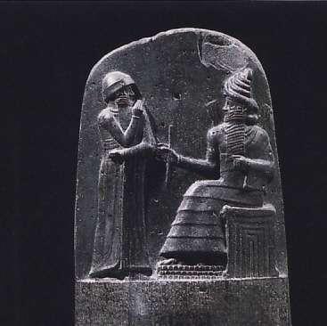 King Hammurabi stands