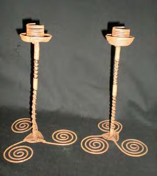 Candle Holders Shabbat and Holiday The base of these handcrafted candlesticks are designed with rusted and
