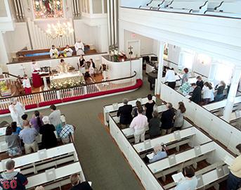 Hence, the parish offers two services, 8:00 a.m. (no music) and 10:00 a.m. (with music), conducted weekly. The 8:00 a.m. averages 15 20 people and the 10:00 a.m. service averages 70 80 people, including children from infants to teens.