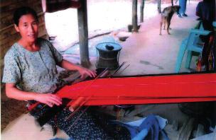 She is an expert weaver, using the traditional backstrap loom.