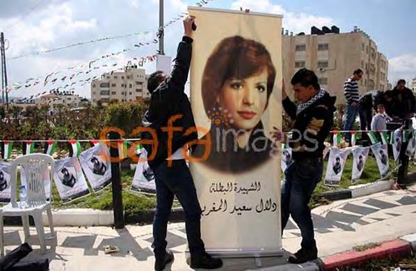 5 Fatah activists in Ramallah hang a picture of terrorist Dalal al-magribi, who participated in the massacre on the Coastal Road (Hamas' Safa News Agency, March 13, 2011) The Gaza Strip Overview The