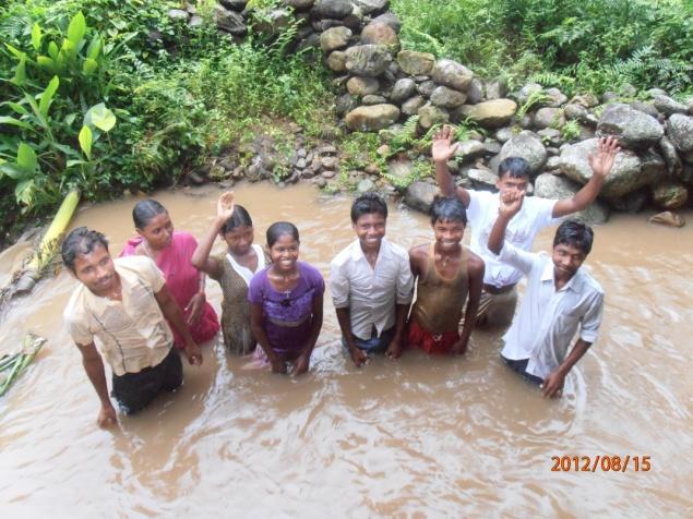 After the gospel meeting 7 people came ahead for baptism. Brother Paraju Majhi baptized them in the small stream nearby.