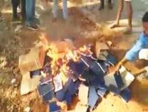 Several cartons of the Holy Bible were seized from their possession and set on fire.