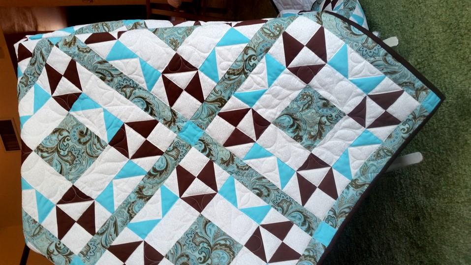 COM HERITAGE QUILT DRAWING Queen Size Quilt - Aqua, Brown, & White by Wilda Dillman ($1,500 Value) Awarded July 1 - just before the Fireworks - NEED NOT BE PRESENT TO WIN TICKETS: $5 / for
