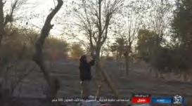 Left: ISIS operative firing a machine gun (Haqq, December 1, 2017) Right: ISIS operative firing a mortar during clashes in the western suburbs of Albukamal.