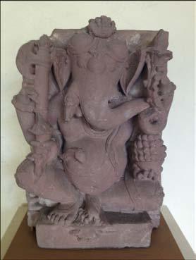 Ganesha Stone relief sculpture A Hindu legend Ganesha was the elephant-headed son of the Indian God Shiva and his beautiful wife Parvati.