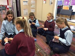 Mini Vinnies Friday lunchtimes we have a keen group of knitters busily knitting squares to make into rugs that we will