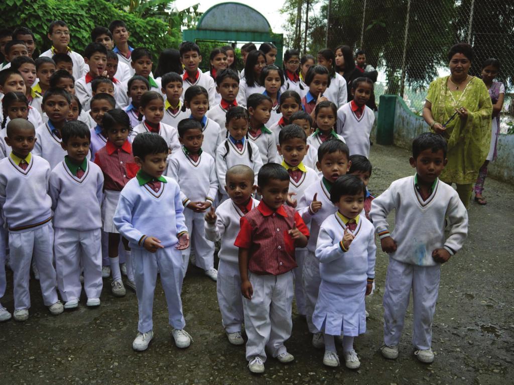 7 Question 6 Religion and Young People Look at the photograph below, which shows children at a faith school in India.