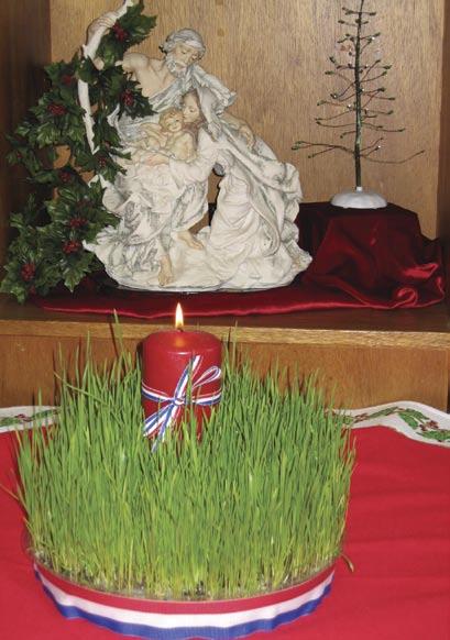 Since wheat is the symbol of the Eucharist this special Christmas wreath is often placed near a nativity set or creche on