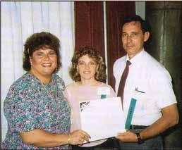 Catastrophic Assistance Program Utah - Barbara Burchfield with Warden and Mrs. Tom House.