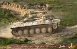 Photos uploaded to an ISIS-affiliated Twitter account show the preparations for the attack, the suicide bomber driving the APC, the APC exploding, the destruction of the outpost, the