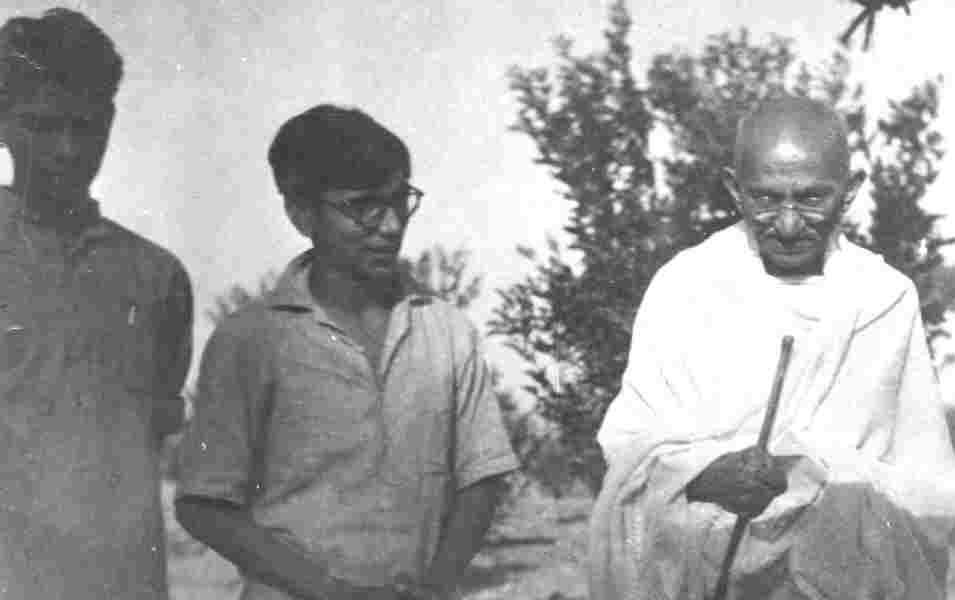 147- Mahatma Gandhi and two other people