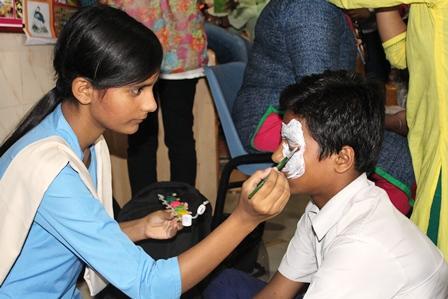Photographs of face Painting Competition Students participating in Face painting Competition