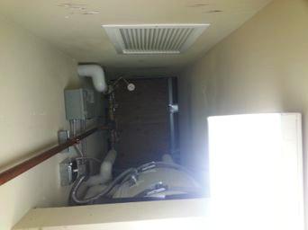 This custodial closet was not even big enough to accommodate the water heater; it was 12 feet above the floor on a ledge that was apparently designed specifically for it.