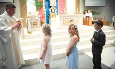 For the second-graders preparing for their first sacraments, this spring holds special meaning as they receive God s merciful forgiveness through Reconciliation, and then prepare to receive Him