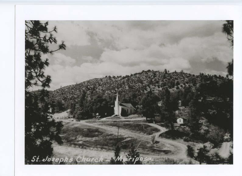 Photograph 8: View looking northeast at the church from an adjacent hill to the southwest, circa