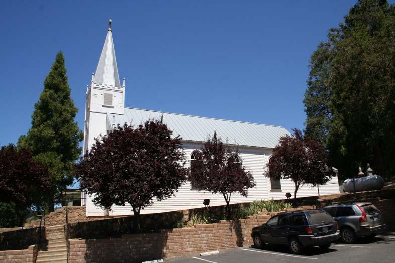 Photograph 13: Present-day view of the church looking north from the parking lot on the south side of the parcel.