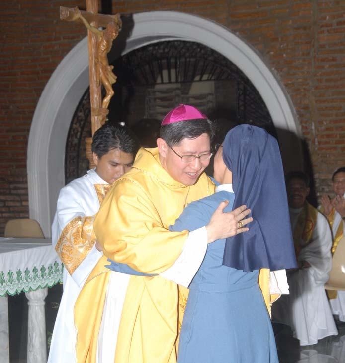 Spirit. With the kiss of peace, Bishop Tagle greeted Sr.