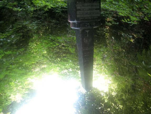 Tarashcha Babi Yar Mass Grave Marker, Hebrew, Russian and the Hammer and Sickle The place was so deep in the woods, you might live your whole life in that town and never know it was there.
