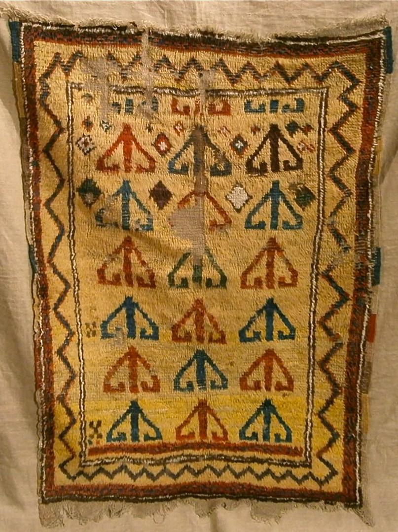Sartirana, cont. Top left: Fragment of a Tekke chirpy (Mohammed Tehrani). Left: Fragments of a Malatya Kurdish rug (Alberto Boralevi).