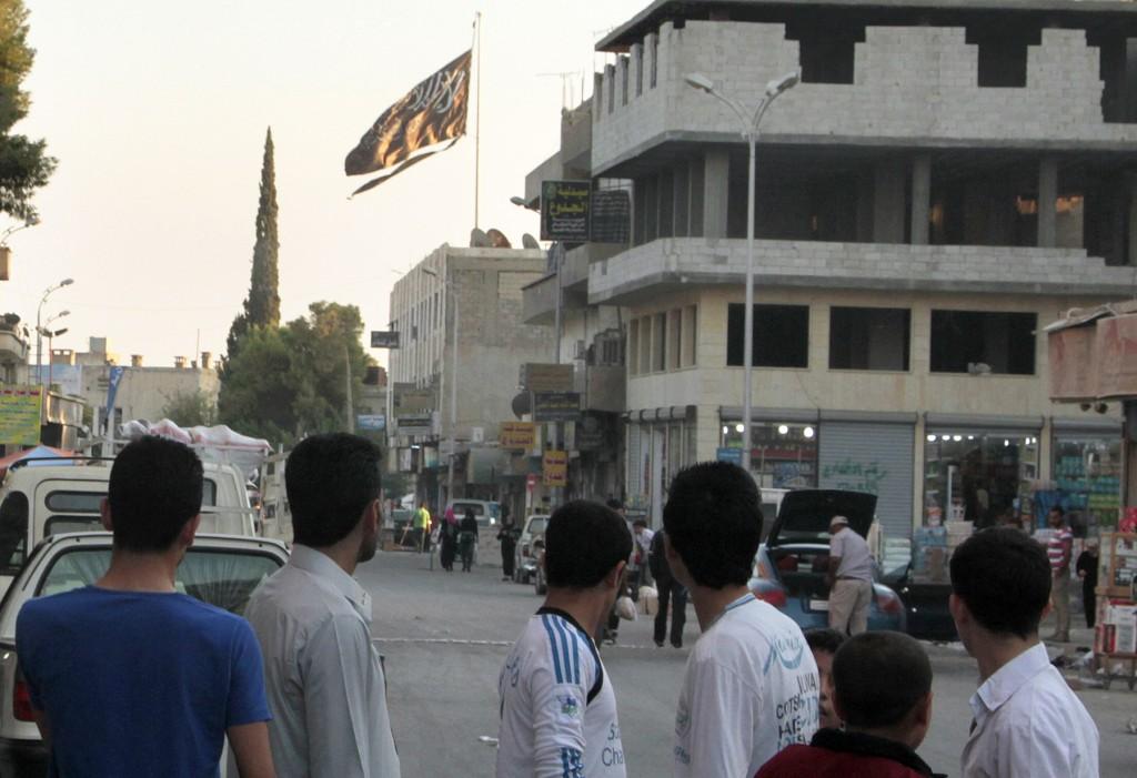 A black jihadist flag flies in the northern rebel-held Syrian city of Raqqa, on Sept. 28, 2013. MOHAMMED ABDUL AZIZ/AFP/Getty Images The second thing to note is that while the U.S. claims it has come to an agreement with Turkey on working together to capture Raqqa, it is not clear who is actually going to be fighting.