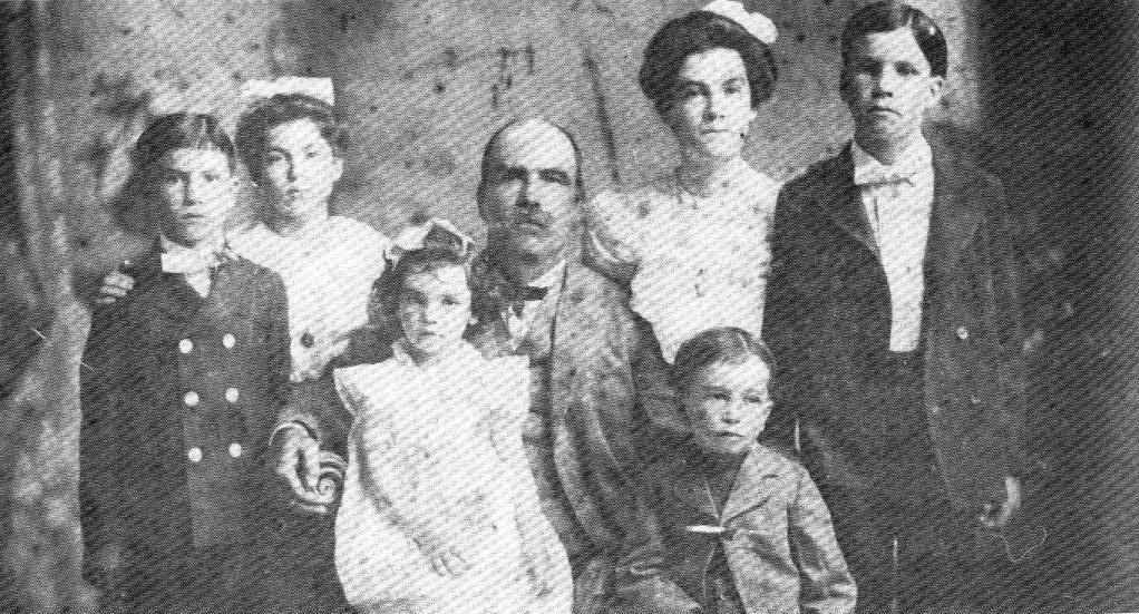 Joseph Haywood Jared family. Standing from left is: Robert Ralph Jared; Mary Bryant Jared who married Tom Miles; Hallie Jo Jared who married William Travis: Horace Jared.