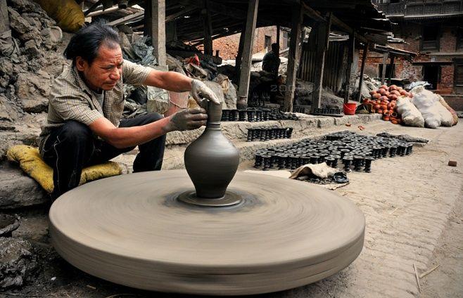 Every pot is examined by hand before being turned to face the sun at new angle or dipped into a bucket of colored water. Experience the pottery making skill.