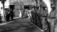 prison police, waiting for the special guest in front of Tumkur District Prison. (Below) Special guest Mr. S. Muniswamy, IPS, the Superintendent of Police, Tumkur District arriving after taking the guard of honour.