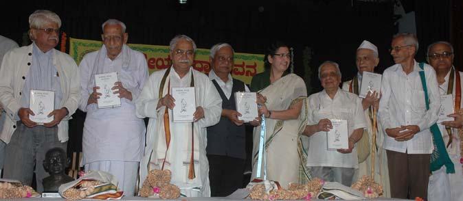 Dignitaries on the dias pose after releasing the 24th volume of the 'Gandhi Kruthi Sanchaya' in Kannada attention had been paid to maintain uniformity in translation.