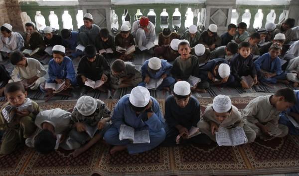 Boys reading the Qur an