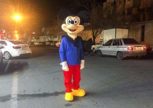 In Tehran, a man in a Mickey Mouse