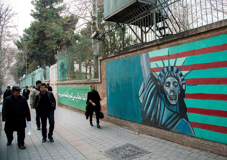 An Iranian version of the Statue of Liberty on the walls of the former American embassy in Tehran, which