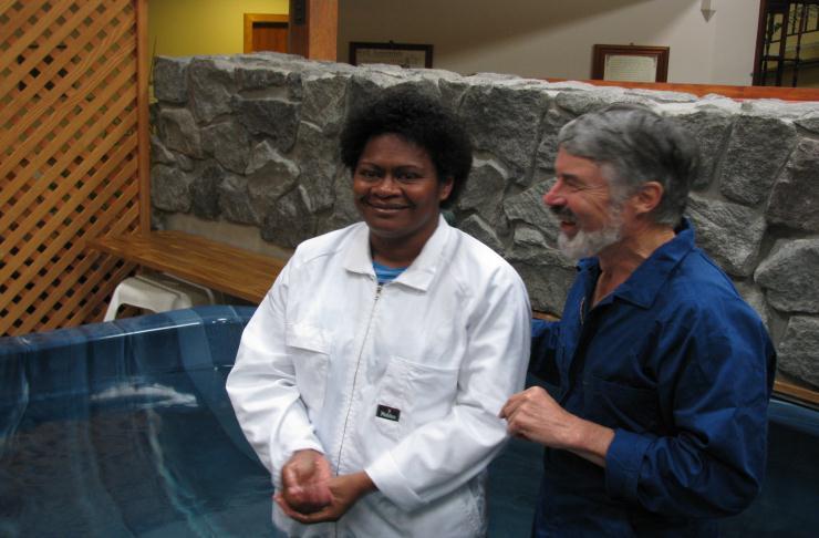 Soko Niko being baptized