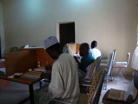 All of the participants engaged in mending each of the 700 folios edge tears. Malam Ahmadu trimmed all ICP and edge mends.