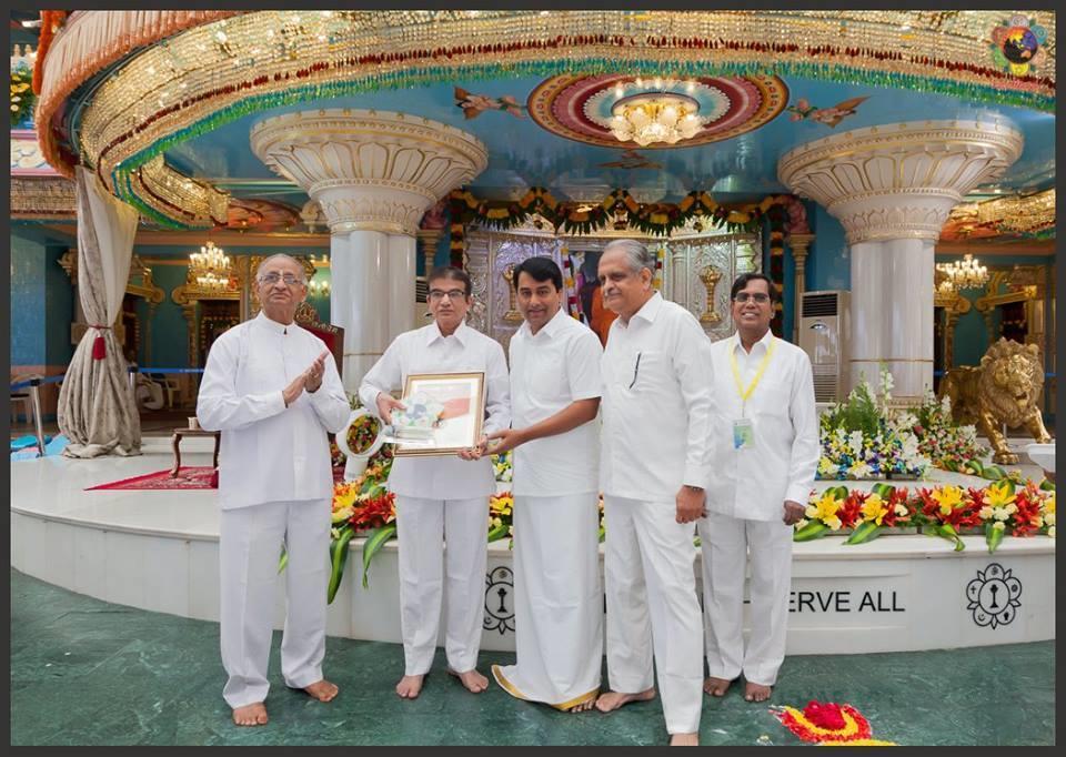 receiving the Sri Sathya Sai Dhanvantari Seva Award for outstanding
