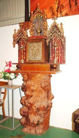 TABERNACLE CANDLESTICKS: Central to the church is the beautiful hand carved Spanish wood Tabernacle.