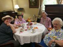 Seated at this table for our Hot Tea and Hat Social are (from left to right) Kathy Woods, Kay Potter, Jane Elliott and Amelia Jackson.