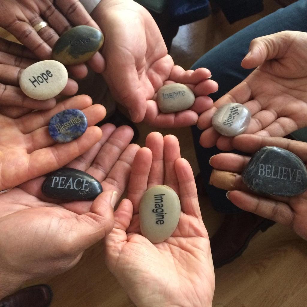 At the final group meeting the chaplain presented the group with a dish of engraved stones and asked everyone to select a word that captured