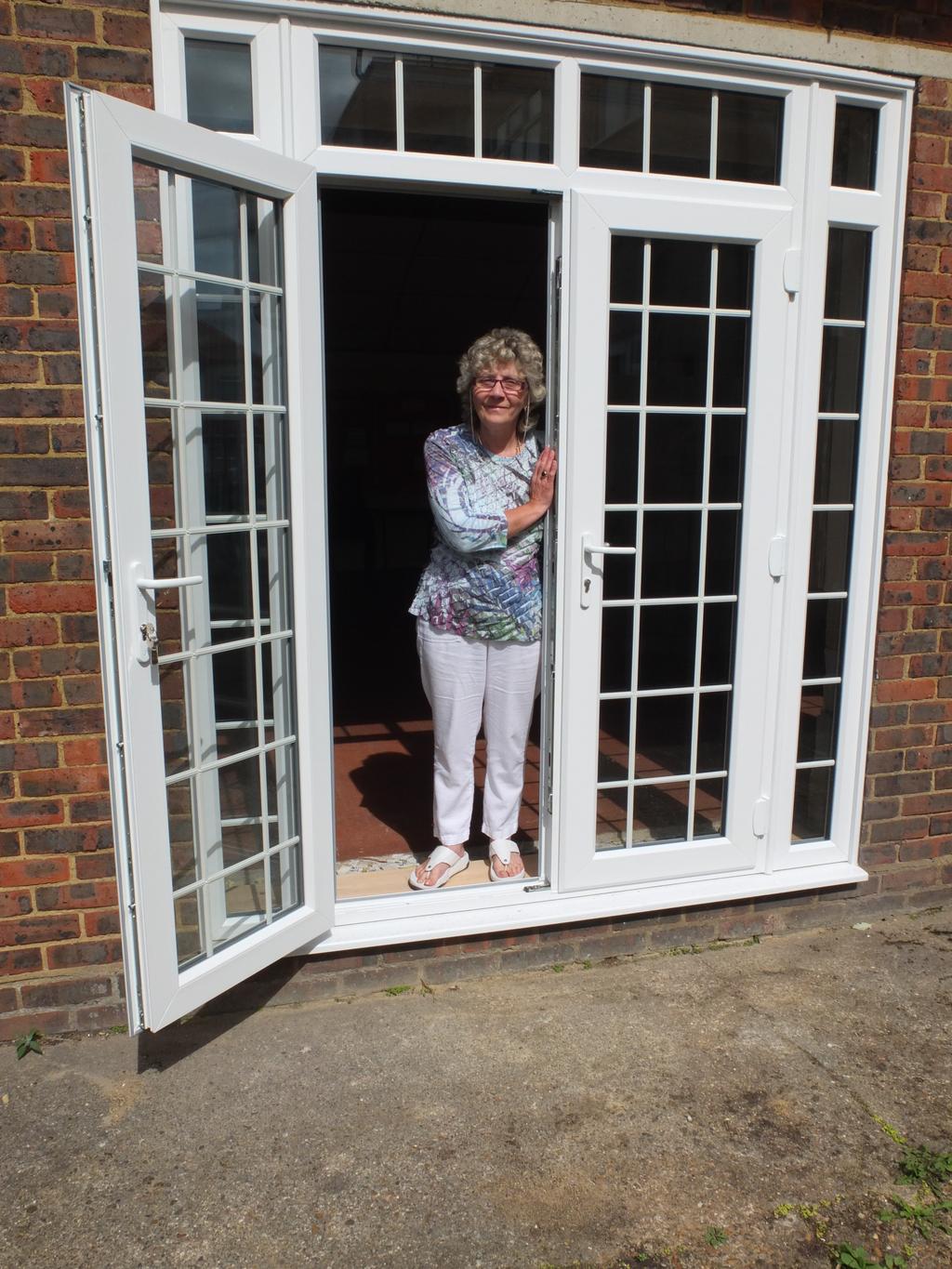 Picture: Margaret Kingswood Jane Wasbrough has been campaigning for doors to provide access to e area outside e hall, and happily is was part of e work covered by Epsom's gift.
