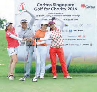 MediaCorp actor and actress Huang Shinan and wife Pan Lingling posing for the Golf for Charity 2016.