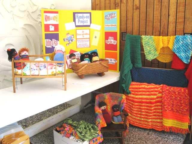 The hands on projects this year were to knit and crochet prayer shawls, preemie caps and dolls, which were blessed at the School.