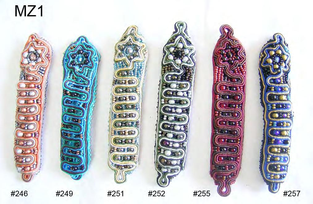 Hand Beaded Mezzuzot Made in: Guatemala Size: 4 inches long, scroll fits in pouch in back