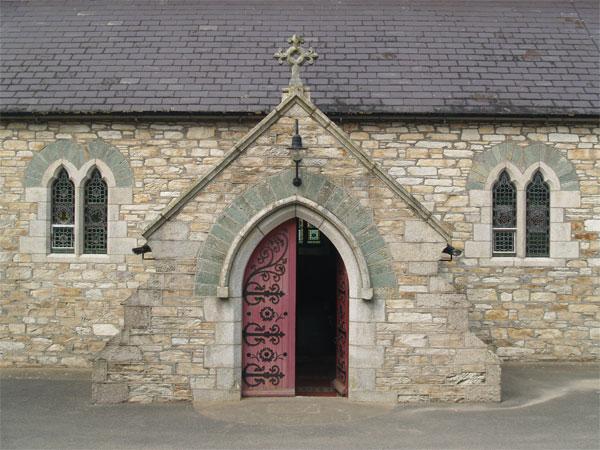 bays of the north side, with its own external entrance via a shouldered arch door set in a pentroof porch.