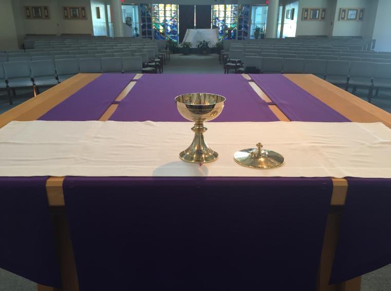 The Altar Setting Set by the Acolytes During Communion - Each EMHC will have taken a Ciborium or a Cup with a Purificator from the altar when they descend from the sanctuary to serve the congregation.
