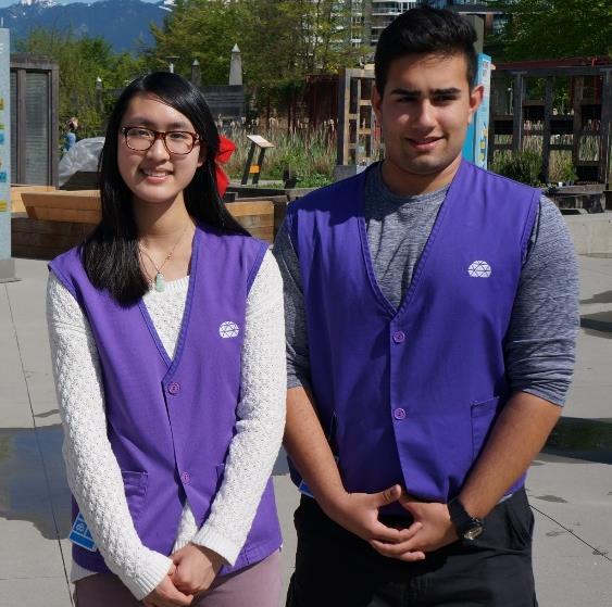 The staff wear blue shirts and the volunteers wear purple vests, just like in this photo!