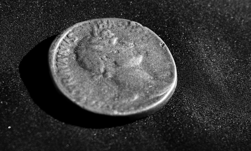 Part B Religion and Belief Source A shows a coin from a Roman grave. Source B is from an ancient Roman writer.