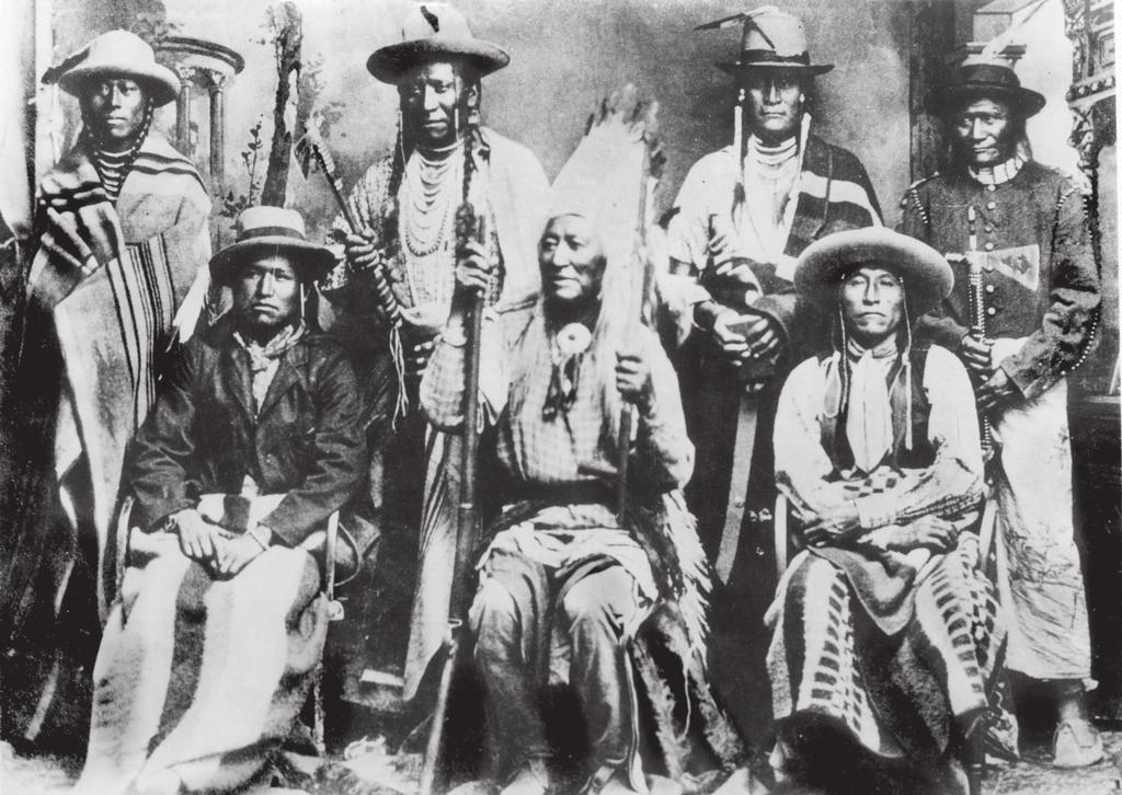Indian Relations in Utah during the Civil War 213 Chief Washakie (front, center) with members of his tribe. (Utah State Historical Society) personified by Patrick Connor and the U.S. Army, was a disciplinarian approach.